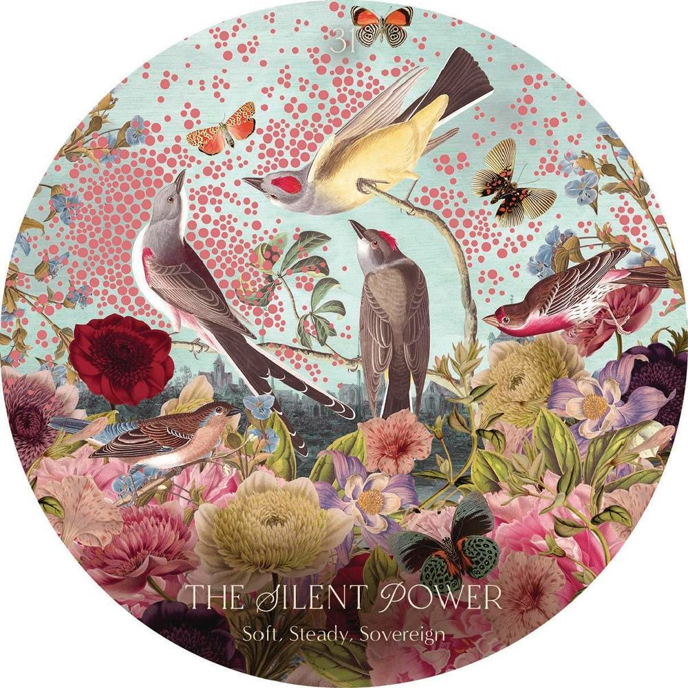 Round oracle card with birds and flowers, featuring the text 'The Silent Power' and 'Soil. Steady. Sovereign'.