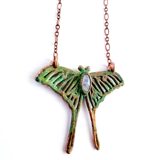 necklace green luna moth on a white back ground