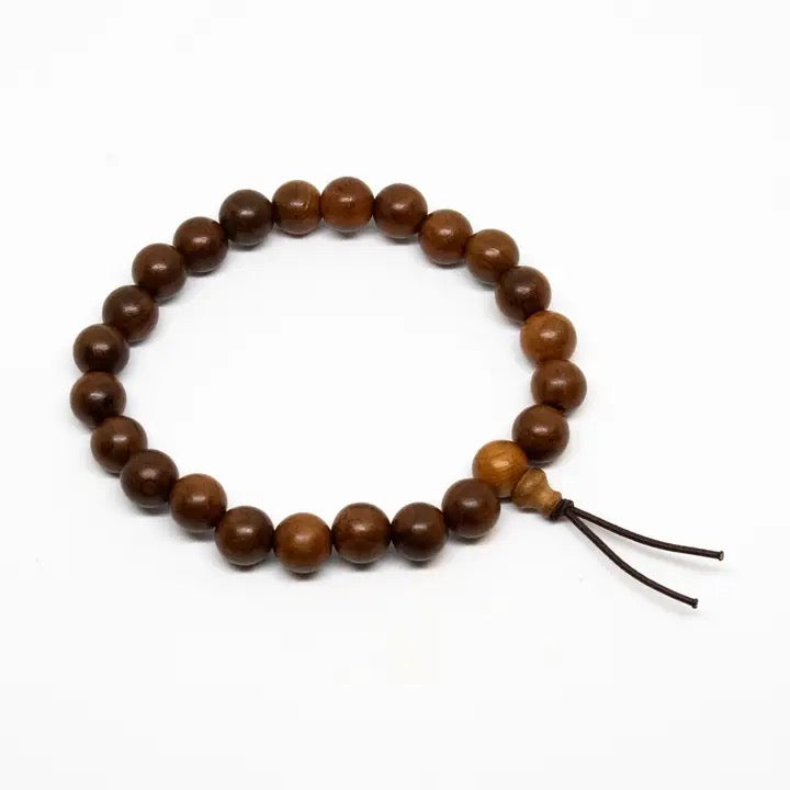 Wooden beaded bracelet on a white background