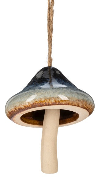 Ceramic mushroom ornament with a textured surface and ceramic stem, hanging from a string.