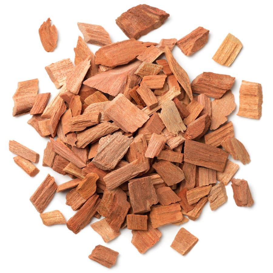 Pile of small wooden chips on a white background