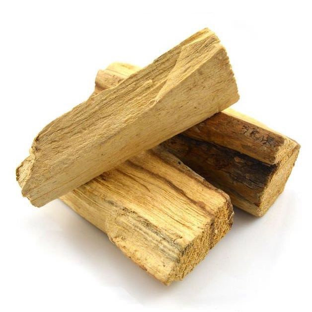 Three pieces of wood stacked on a white background