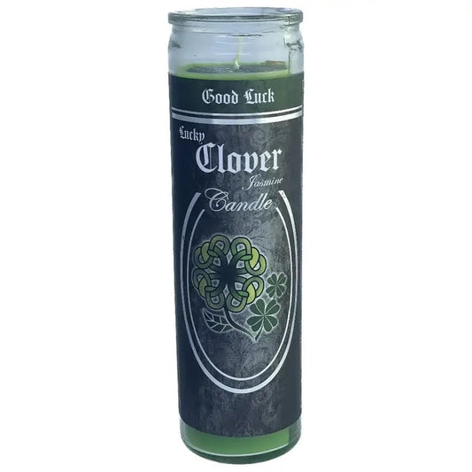 Green candle with a label on a white background