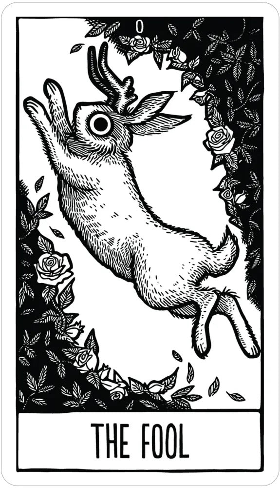 Tarot card featuring 'The Fool' with a goat and roses, black and white.