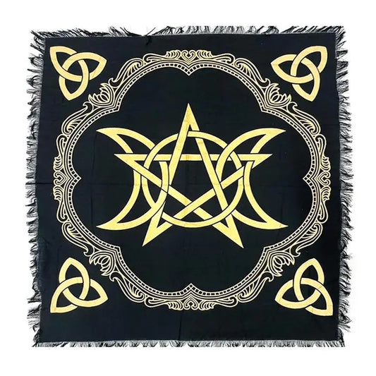 Black square cloth with gold geometric design and fringed edges