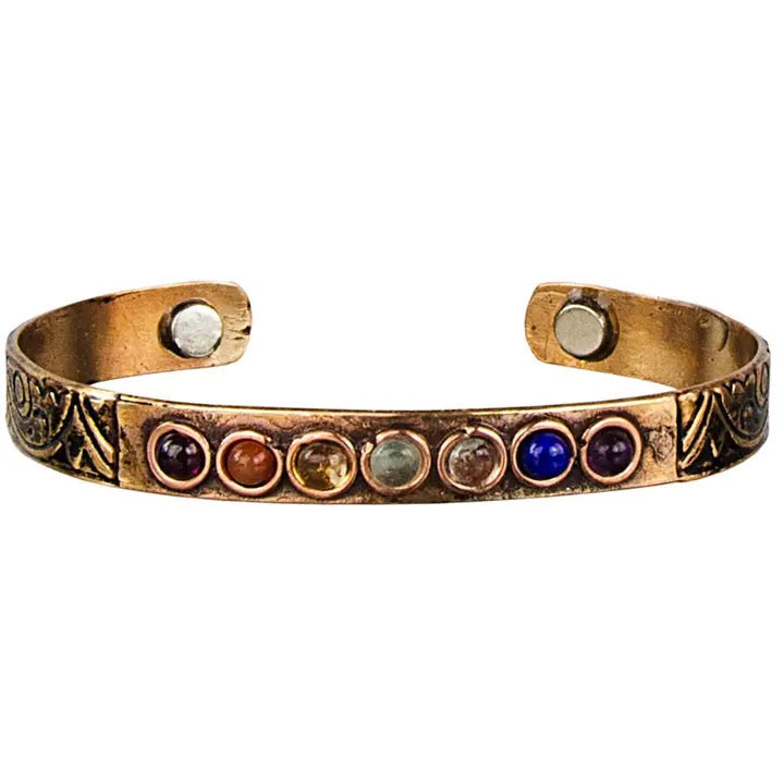 Copper bracelet with colorful stones on a white background