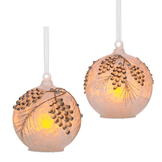Two decorative hanging lights with a floral design on a white background