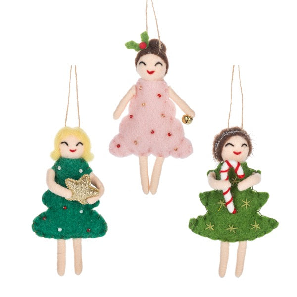 Three decorative dolls in Christmas-themed outfits on a white background