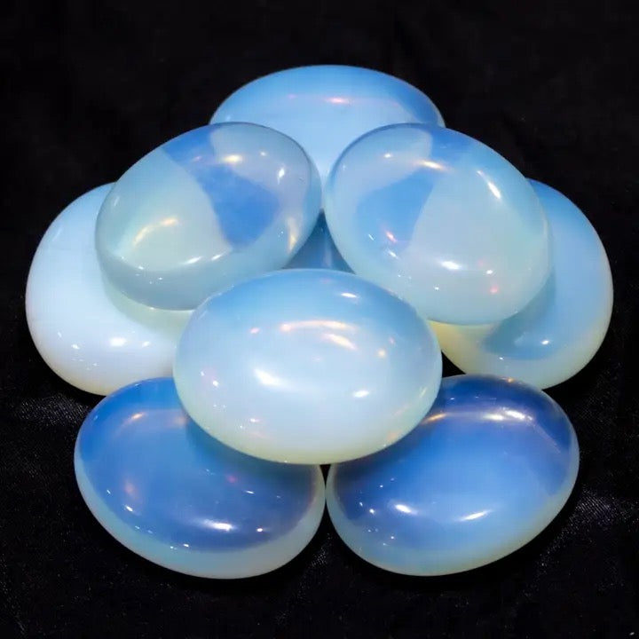 Opalite Palm Stone black background