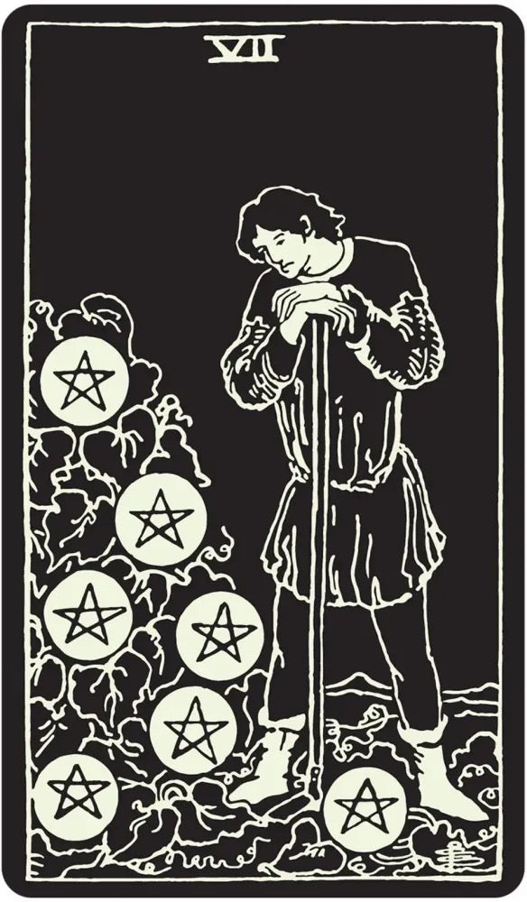 Tarot card with a figure holding a staff and pentacle symbols on a black background