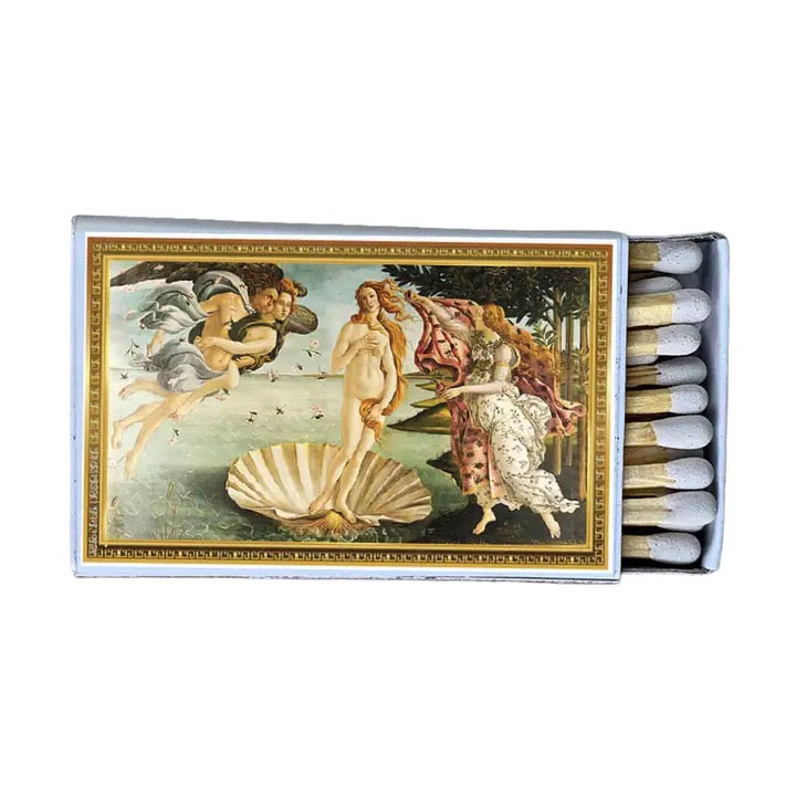 Venus on a shell matches on a white background
