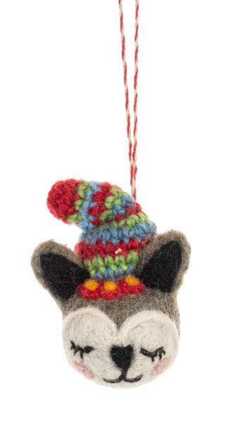 Felted fox ornament with a colorful knit hat on a white background