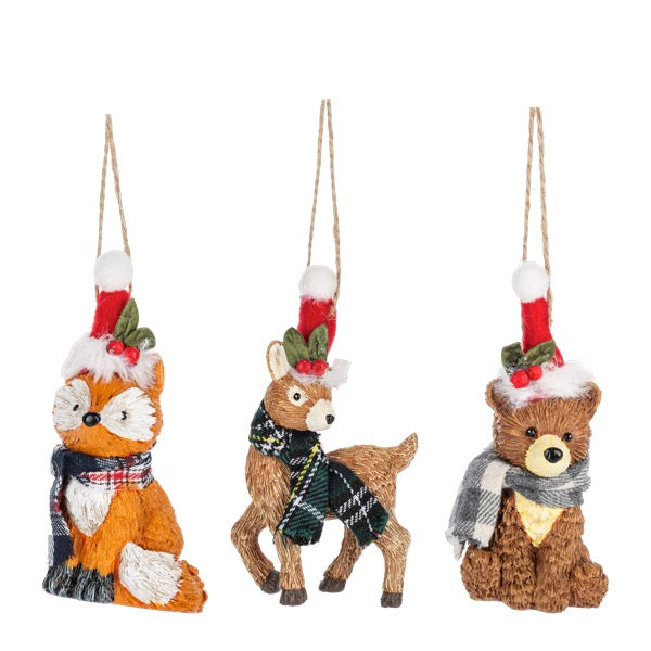 Set of three festive animal ornaments including a fox, deer, and bear, each wearing a scarf and hat on a white background.