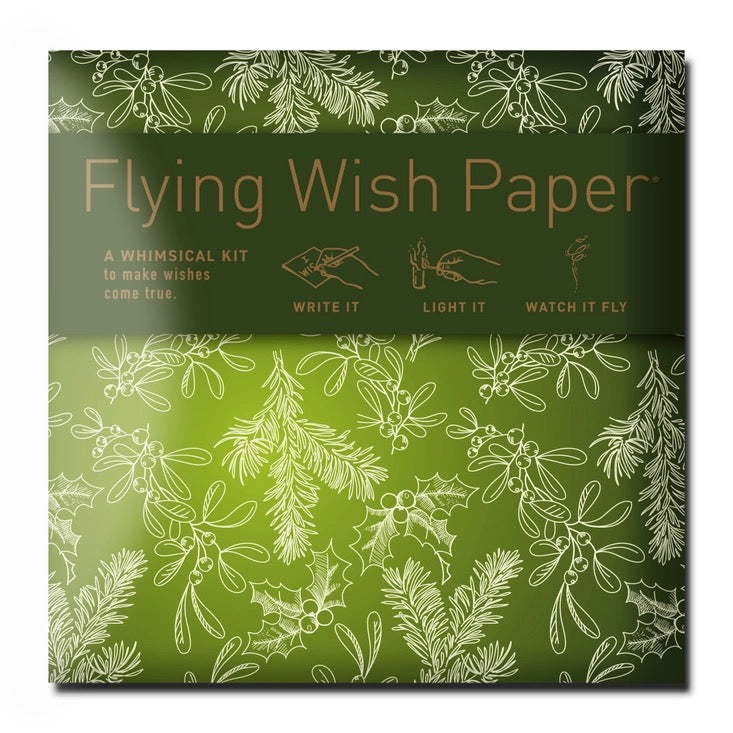 Green package of 'Flying Wish Paper' with floral patterns and text.