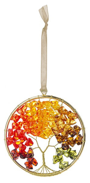 Decorative ornament with colorful stones shaped like a tree on a white background