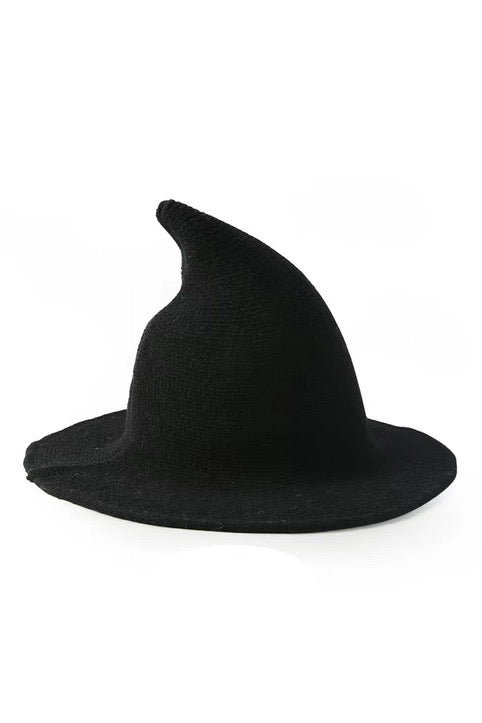 A black felt witch hat with a wide brim, photographed on a clean white background.