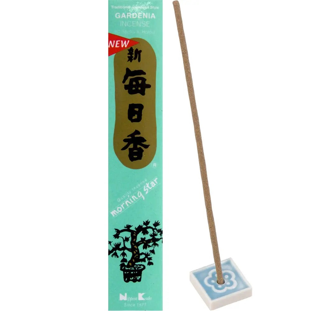 Incense stick with packaging labeled 'Gardenia' on a white background