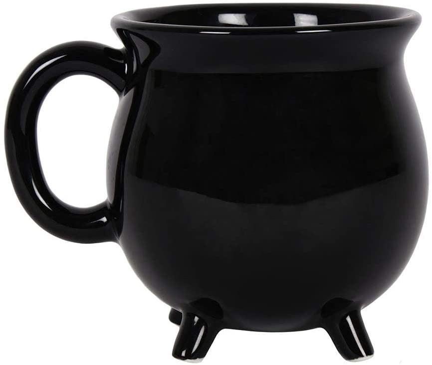 Black mug with legs on a white background