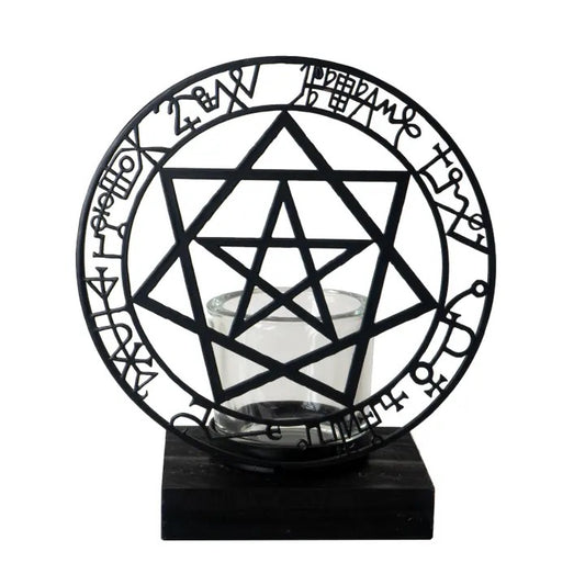 Decorative candle holder with geometric design and sigils on a white background