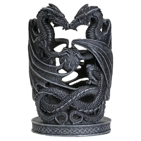 Decorative black dragon sculpture on a white background