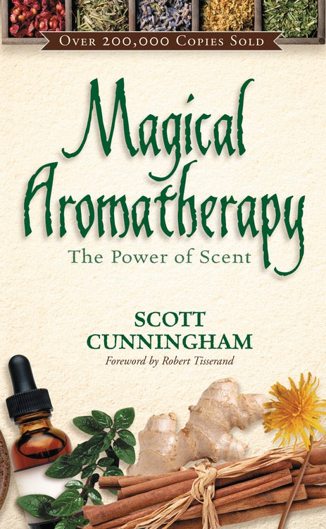Book cover of 'Magical Aromatherapy' by Scott Cunningham with herbs and a dropper on a beige background.