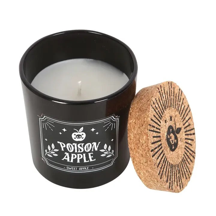 Black candle jar with 'Poison Apple' label and cork lid on a white background