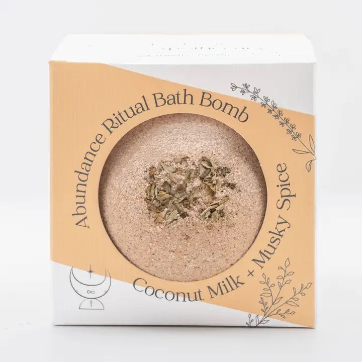 Bath bomb in a cardboard packaging with text on a white background