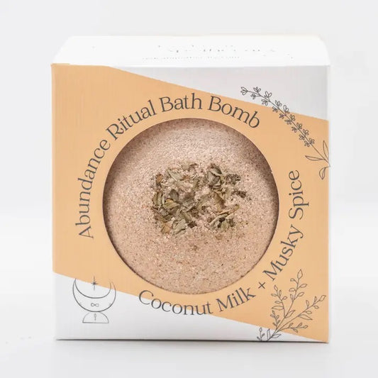 Bath bomb in a cardboard packaging with text on a white background