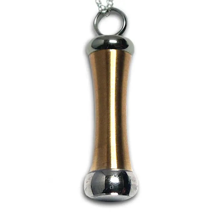 Black and Copper cylindrical object on a white background