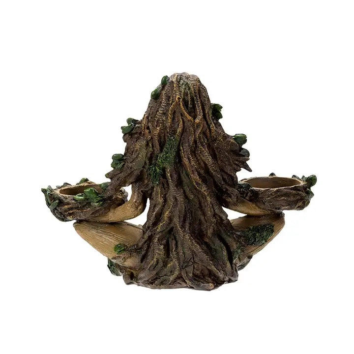 Decorative tree root-like structure with three small bowls on a white background