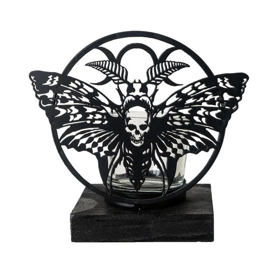 Decorative item with butterfly and skull design on a black base
