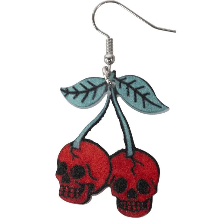 Cherry earrings with skull designs on a white background