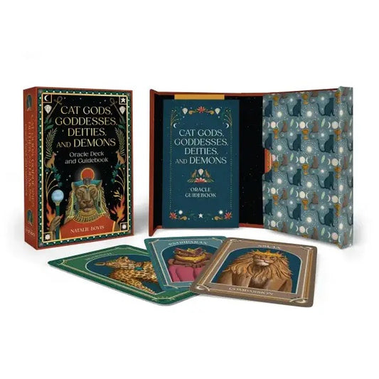 The Cat Gods Oracle Deck and Guidebook set by Nature Banks, featuring the illustrated outer box, the open inner book with patterned cover, and several example cards displaying different animal-themed illustrations on a clean white background.