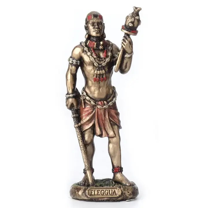 Statue of a warrior figure with armor and weapon on a white background