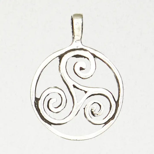 Silver triskele pendant on a white background