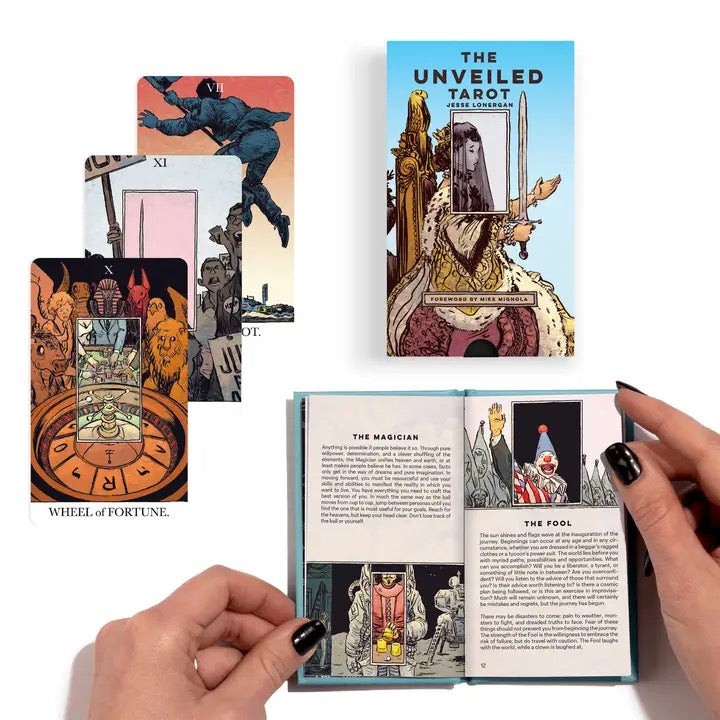 Unveiled Tarot cards with a book and hands holding the book open.