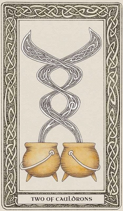 A tarot card titled 'TWO OF CAULDRONS' showing two small cauldrons at the bottom connected by a central knot-like symbol, with an ornate Celtic border around the card.