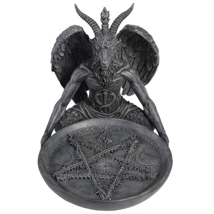 Statue of Baphomet a being with wings and horns, sitting on a pentagram symbol, on a white background.