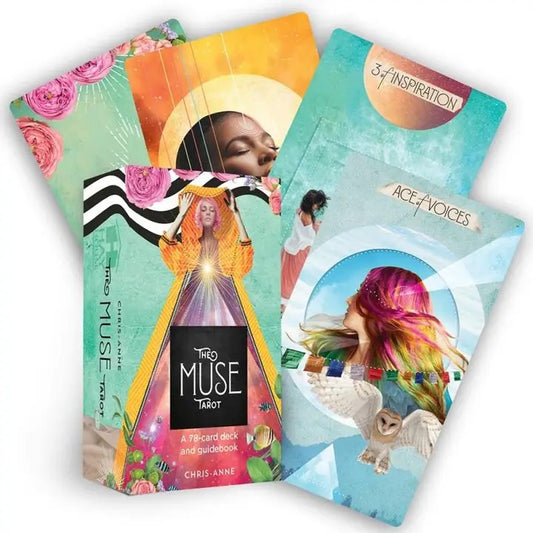 Collection of colorful tarot card decks with artistic designs on a white background