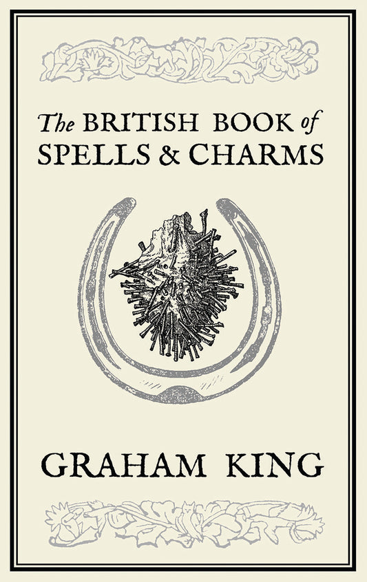 Book cover of 'The British Book of Spells & Charms' by Graham King with a horseshoe and star design.
