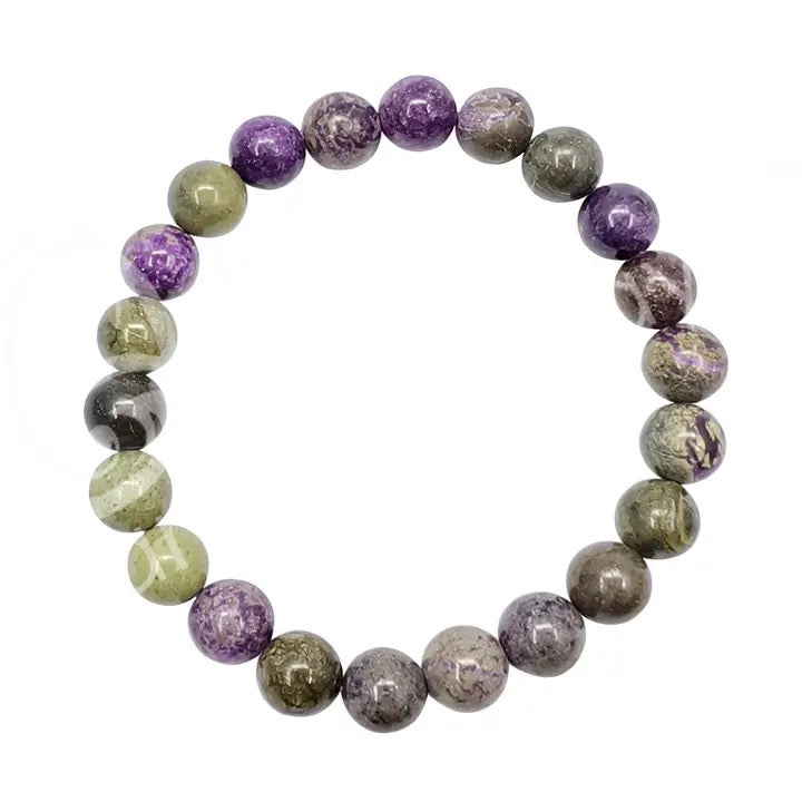 A beaded stretch bracelet made of polished round gemstone beads in purple, olive green, and gray, arranged in a circular shape on a plain white background.