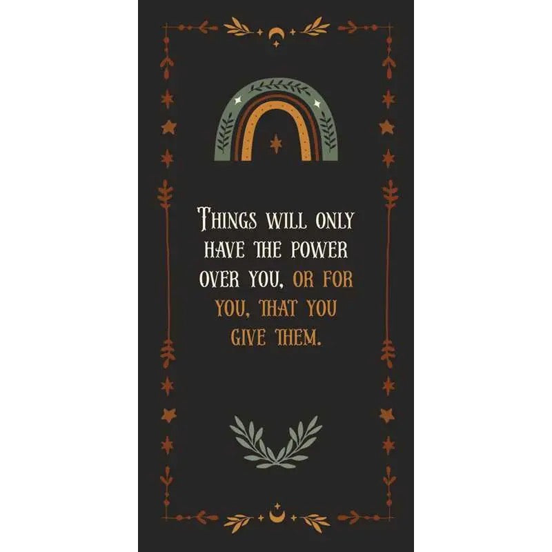 Motivational quote with a rainbow design on a dark background