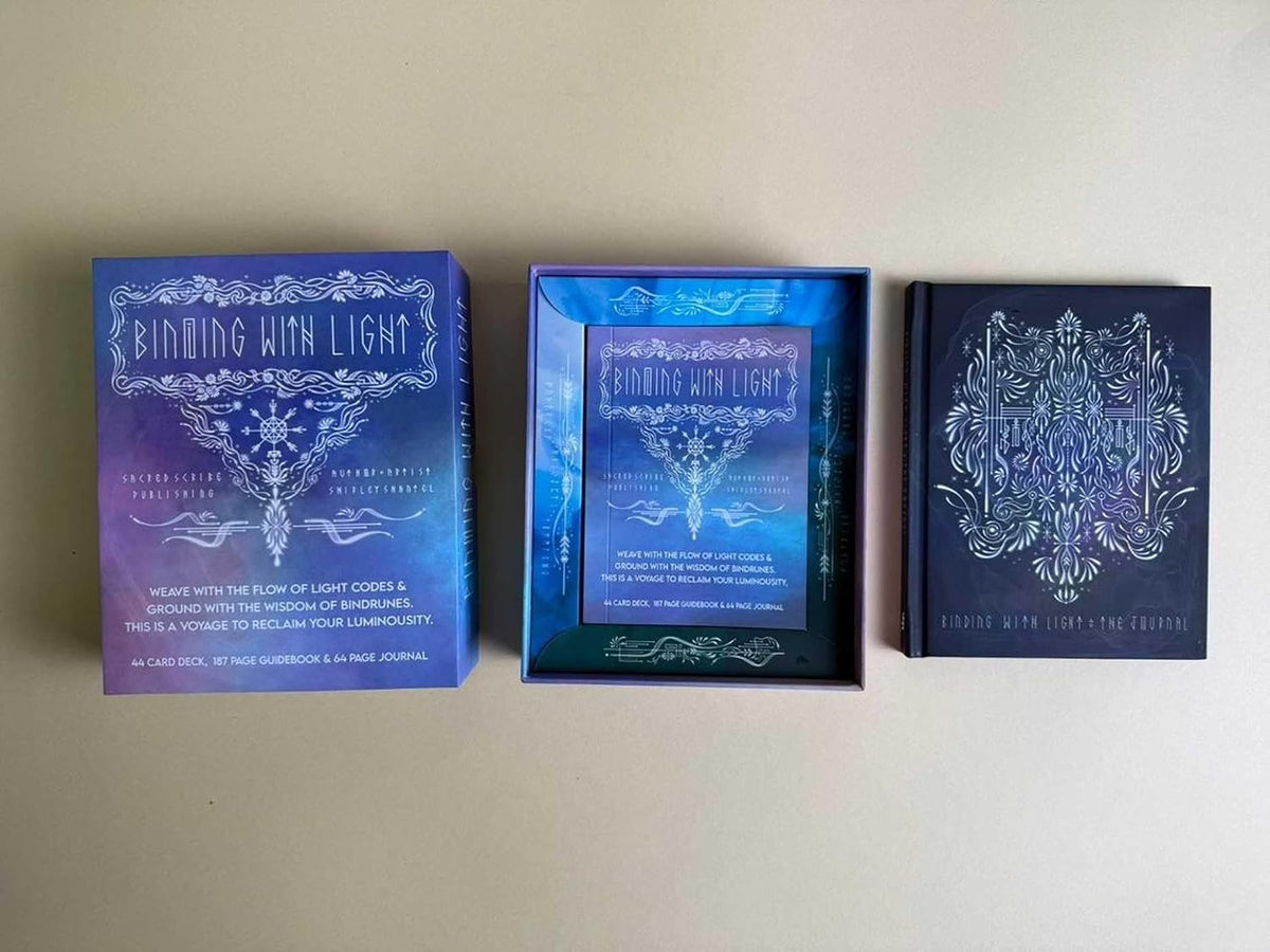 Front of deck box inside of box and cover of book with designs on and Binding With Light on the front.