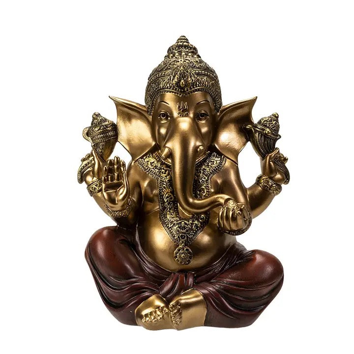 Bronze and red Ganesha statue on a white background