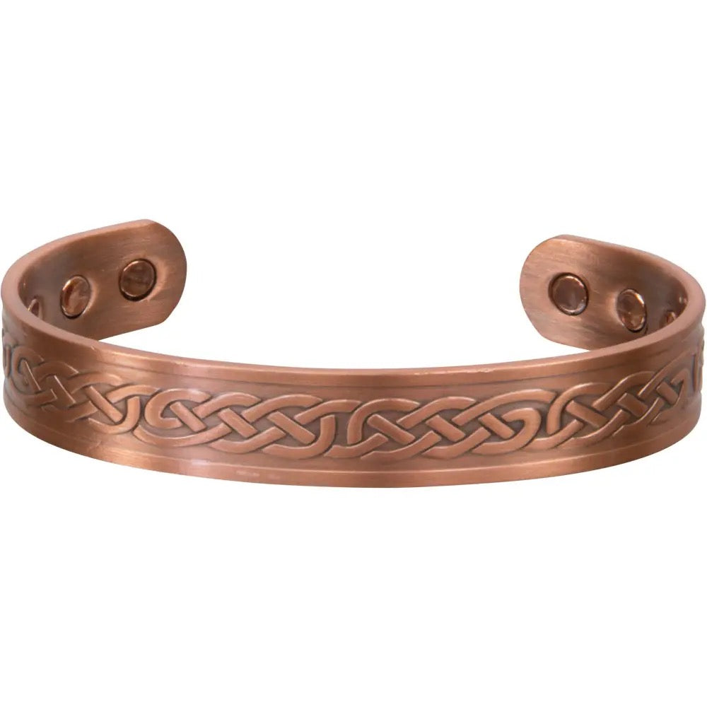 Copper bracelet with braided design on a white background