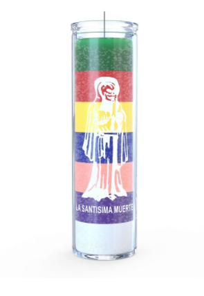 Candle with a colorful label featuring a white figure on a white background