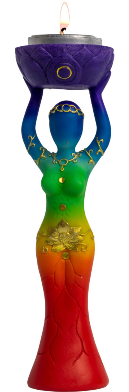 Colorful candle holder shaped like a woman with a lit candle on top