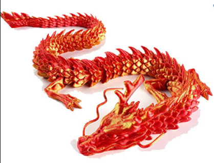 Red and gold dragon figurine on a white background