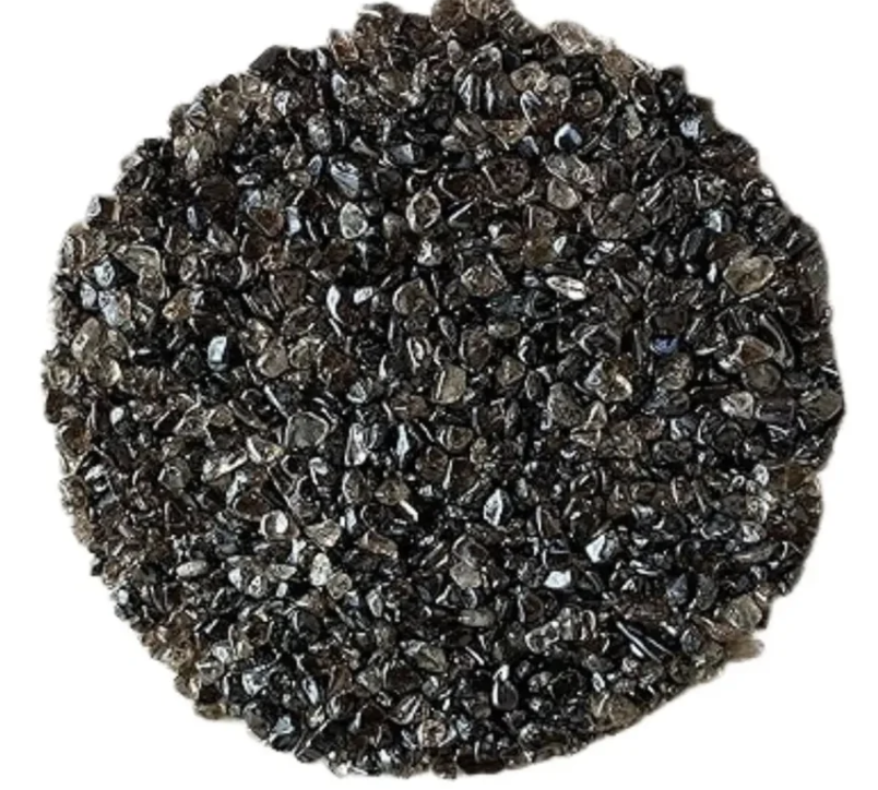 Close-up of dark-colored stones on a white background