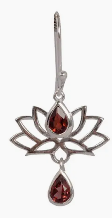 Silver earring with lotus design and red gemstones on a white background